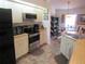 Well-equipped kitchen with stainless steel appliances and a seamless flow to the dining space at 7923 Glenridge E Loop, Lakeland, FL 33809