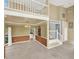 Open floor plan featuring the staircase, elegant chandelier, and access to the kitchen at 351 Crystal Ridge Way, Lake Mary, FL 32746