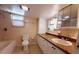 Clean bathroom with updated vanity and bathtub at 313 S Ridgewood Ave, Deland, FL 32720
