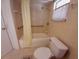 Updated bathroom with tub/shower and grab bars at 313 S Ridgewood Ave, Deland, FL 32720