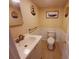 Small bathroom with white vanity and toilet at 313 S Ridgewood Ave, Deland, FL 32720