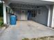 Covered carport area next to the house at 313 S Ridgewood Ave, Deland, FL 32720