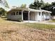 House exterior showcasing carport at 313 S Ridgewood Ave, Deland, FL 32720