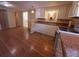 Kitchen with wood flooring and white cabinets at 313 S Ridgewood Ave, Deland, FL 32720