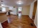 Open kitchen with breakfast bar and view to living room at 313 S Ridgewood Ave, Deland, FL 32720