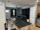 View of the living room with an open concept to the kitchen at 508 Garden N Dr, Lakeland, FL 33813