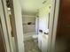 Well-maintained bathroom with tiled walls, shower, and modern vanity and light fixtures at 105 Byron Pl, Winter Haven, FL 33884