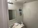 Cozy half-bath showcasing modern fixtures, a vanity, and a mirrored wall at 105 Byron Pl, Winter Haven, FL 33884