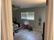 Cozy bedroom featuring modern ceiling fan, a window, and a comfortable layout at 105 Byron Pl, Winter Haven, FL 33884