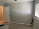 Bright bedroom featuring a large window and a neutral color scheme at 105 Byron Pl, Winter Haven, FL 33884