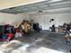 View of garage space featuring a metal roof with ample storage options at 105 Byron Pl, Winter Haven, FL 33884