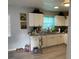 Kitchen featuring ample cabinets, stainless appliances, and modern countertops at 105 Byron Pl, Winter Haven, FL 33884