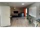 Open living room featuring modern furnishings, light gray paint, and plenty of space at 105 Byron Pl, Winter Haven, FL 33884