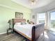 Bright bedroom with a comfortable bed and scenic view at 5300 S Atlantic Ave # 6-505, New Smyrna Beach, FL 32169