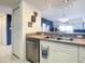 Kitchen boasts stainless steel appliances and ample counter space at 5300 S Atlantic Ave # 6-505, New Smyrna Beach, FL 32169