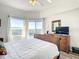 Main bedroom with stunning water views and comfortable bed at 5300 S Atlantic Ave # 6-505, New Smyrna Beach, FL 32169