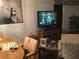 Casual dining area with wood table and seating for four at 4811 Saxon # A201, New Smyrna Beach, FL 32169