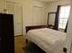 Bedroom featuring closet space, a comfortable bed, and a window with lots of natural light at 1470 Ne Old Mill Dr, Deltona, FL 32725