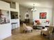 Open-concept living space featuring stylish furniture, modern decor, and ample natural light at 1470 Ne Old Mill Dr, Deltona, FL 32725