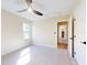 Bedroom with ceiling fan and carpet flooring at 804 Soft Pine Ct, New Smyrna Beach, FL 32168