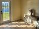 Bright bonus room with view to backyard and access to patio at 804 Soft Pine Ct, New Smyrna Beach, FL 32168