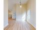 Bright dining room with light walls and wood floors at 804 Soft Pine Ct, New Smyrna Beach, FL 32168