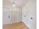 Spacious entryway with wood floors and white doors at 804 Soft Pine Ct, New Smyrna Beach, FL 32168