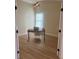 Bright home office features hardwood floors and french doors at 804 Soft Pine Ct, New Smyrna Beach, FL 32168