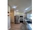 Modern kitchen with stainless steel appliances and light gray cabinets at 804 Soft Pine Ct, New Smyrna Beach, FL 32168