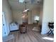 Bright living room with vaulted ceilings, skylights, and a fireplace at 804 Soft Pine Ct, New Smyrna Beach, FL 32168