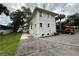 Two-story house with ample parking and walkway at 214 S Riverside Dr, New Smyrna Beach, FL 32168
