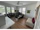 Home office with hardwood floors and lots of natural light at 214 S Riverside Dr, New Smyrna Beach, FL 32168