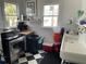 Small kitchen with black and white checkered floor and vintage sink at 214 S Riverside Dr, New Smyrna Beach, FL 32168