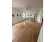Spacious room with hardwood floors, high ceilings, and lots of natural light at 214 S Riverside Dr, New Smyrna Beach, FL 32168