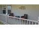 Comfortable outdoor seating area on the porch with nice decor at 806 South St, New Smyrna Beach, Fl 32168, FL 32168