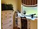 Bright vanity space with ample drawer storage and a window providing natural light at 806 South St, New Smyrna Beach, Fl 32168, FL 32168