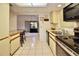 Bright kitchen offering stainless steel appliances, a double sink, and plenty of storage for culinary essentials at 4303 Sea Mist Dr # 225, New Smyrna Beach, FL 32169