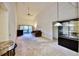 Spacious living room with high ceilings, a ceiling fan, and sliding glass doors to an outdoor area at 4303 Sea Mist Dr # 225, New Smyrna Beach, FL 32169