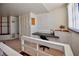 Upstairs office area featuring built-in desk, closet, and a window with natural light at 4303 Sea Mist Dr # 225, New Smyrna Beach, FL 32169
