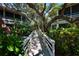 A welcoming walkway leads to the building, surrounded by lush greenery and providing a tranquil entrance at 4303 Sea Mist Dr # 225, New Smyrna Beach, FL 32169