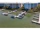Aerial view of community marina with docks and boats, providing residents with access to the water at 1 Riverwalk Dr # 202, New Smyrna Beach, FL 32169