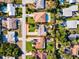 Detailed aerial view of a property with a defined boundary, showcasing the home and its surroundings at 4606 Doris Dr, New Smyrna Beach, FL 32169