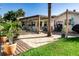 Expansive backyard featuring a pergola, outdoor seating, and a well-maintained lawn at 4606 Doris Dr, New Smyrna Beach, FL 32169