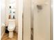 Bathroom featuring a modern toilet and walk in shower at 4606 Doris Dr, New Smyrna Beach, FL 32169