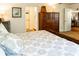 Comfortable bedroom with a spacious closet, ample storage space, and private access to the bathroom at 4606 Doris Dr, New Smyrna Beach, FL 32169