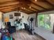 Bright interior of room with high, bamboo ceiling, and exercise equipment at 4606 Doris Dr, New Smyrna Beach, FL 32169