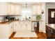Beautiful kitchen featuring granite countertops, stainless steel appliances, and custom cabinetry at 4606 Doris Dr, New Smyrna Beach, FL 32169