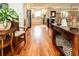 Spacious open kitchen with stainless steel appliances, wooden floors, and lots of natural light at 4606 Doris Dr, New Smyrna Beach, FL 32169