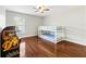 Bedroom with a bunk bed and hardwood floors at 756 Bay Dr, New Smyrna Beach, FL 32168