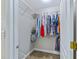 Walk-in closet with ample shelving and hanging space at 756 Bay Dr, New Smyrna Beach, FL 32168